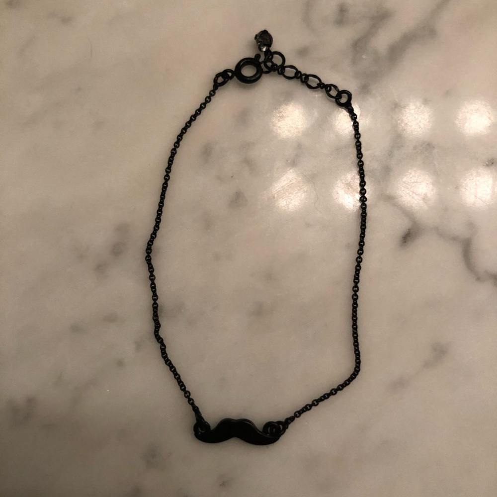 Moustache bracelet.